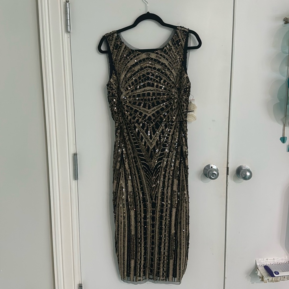 Black and gold below the knee dress, formal, size small, from altered state